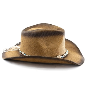 Detail of woven straw cowboy hat featuring shell and blue bead trim on a brown gradient