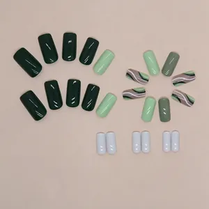 Green wave pattern medium square press-on nails set with glossy green stripes