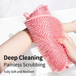 Tappetino in silicone rosa con setole morbide per la pulizia e l'esfoliazione del corpo