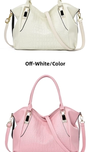 Detail of crocodile embossed faux leather tote bags in cream white and pink colors