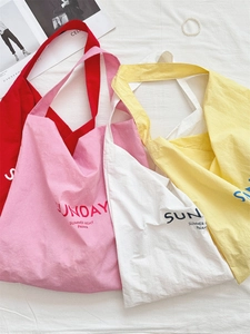 Minimalist canvas tote bags with Sunday Summer Night letter print in four vibrant colors