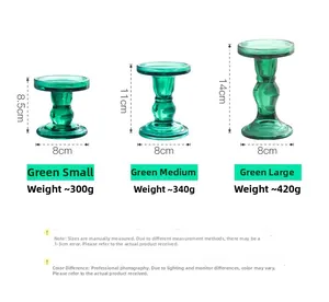 Three sizes of green glass Roman column candle holders with specific height measurements