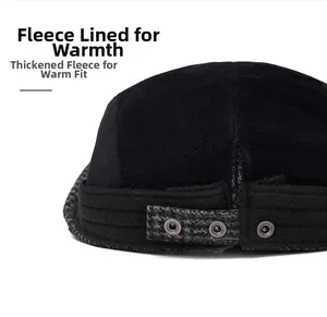 Detail view of the warm fleece lining and adjustable metal buckle on a black beret hat