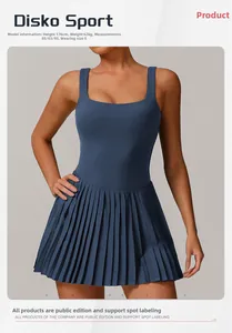 Detail view of navy blue pleated tennis dress with racerback top and matte stretch fabric