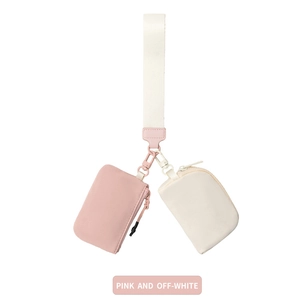 Pink and off-white mini wristlet pouches in water-resistant nylon with wrist strap