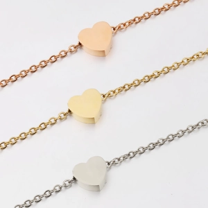 Minimalist heart pendant necklaces in mirror-polished rose gold, gold and silver finishes