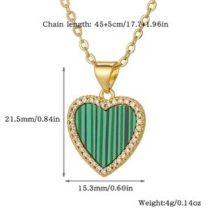 Detail view of heart pendant necklace with green texture and dimensions in inches and mm