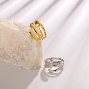 Minimalist spiral stainless steel ring with water drop accents in gold and silver finish