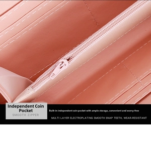 Detailed interior of long wallet showing smooth zipper pocket and multiple card slots