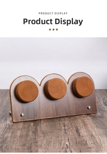 Three-tier walnut wood watch and jewelry display stand with brown velvet circular holders