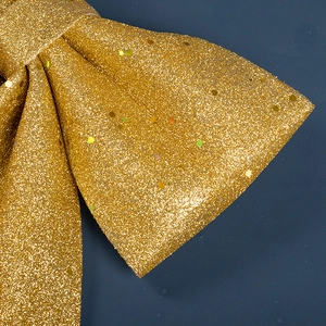 Grand nœud doré scintillant avec paillettes pour décoration festive de Noël
