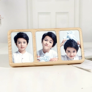 Three-frame wooden picture display made of natural oak wood for desktop home decoration