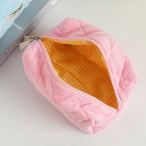 Pink plush quilted cosmetic bag with large capacity and soft checkered lining