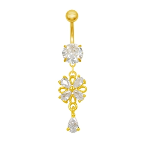 Détail du piercing de nombril doré avec pendentifs fleur et goutte en zircon blanc