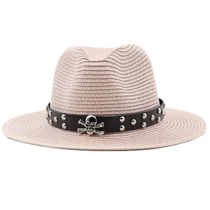 Unisex straw fedora hat with leather belt and metal skull detail for beach and travel