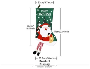 Detail view of green Christmas stocking with Santa pattern and product dimensions