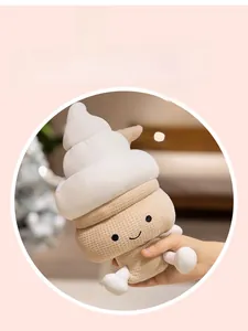 Macro detail of plush ice cream pillow toy with cute embroidered face and waffle cone texture
