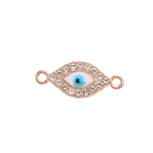 Detail of rose gold evil eye charm with blue center and sparkling micro-pave crystals