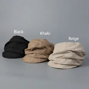 Japanese style linen newsboy caps in black, khaki, and beige with metal button details