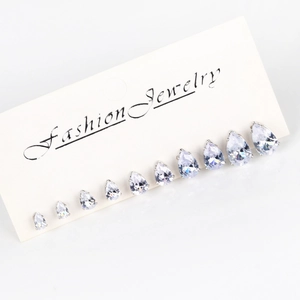 Set of 6 pairs pear-cut cubic zirconia stud earrings in varying sizes on display card