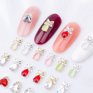 Bowtie gemstone nail art charms set with heart-shaped rhinestones for DIY manicure