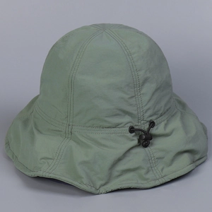 Breathable sage green sun hat with wide brim and adjustable drawstring closure
