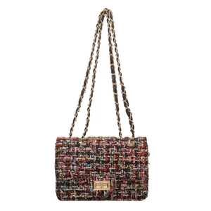 Classic tweed chain flap bag with colorful weave pattern and gold twist lock closure