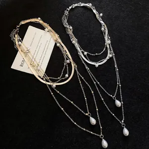 Elegant layered pearl necklace with water drop pendant in gold and silver finish