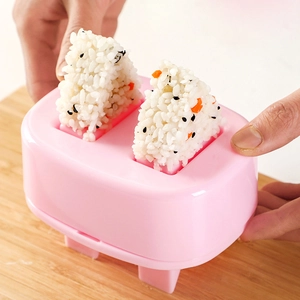 Pink triangular rice ball mold shaker for making Japanese sushi bento snacks