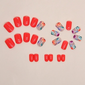 Glossy press-on nail kit with coral red and colorful floral hand-painted flower designs