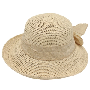 Elegant French straw sun hat for women with wide brim and decorative ribbon bow accent