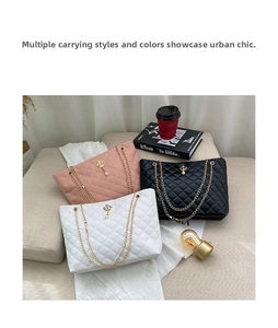Quilted tote bags in pink, black and white featuring pearl crown charms and chain straps