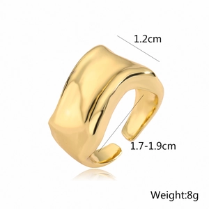 Detailed top view of golden wavy geometric open ring showing 1.2cm width and dimensions