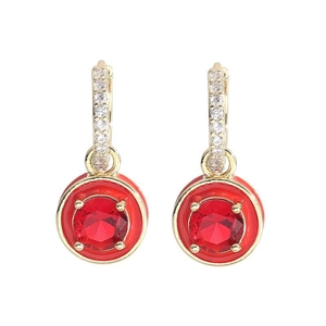 Detail of gold-plated hoop earrings with clear crystals and round red enamel charms