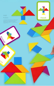 Close-up of colorful wooden tangram puzzle pieces with creative design pattern cards