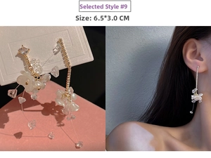 Detail of long dangle earrings with resin petals and crystals on S925 silver needles