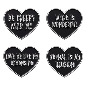 Set of 4 black heart enamel pins with gothic text badges for clothing accessories