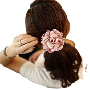 Elegant pink fabric flower hair scrunchie with layered silk petals for women ponytail