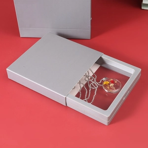 Gray PE film suspension jewelry drawer box with dried flower necklace display detail