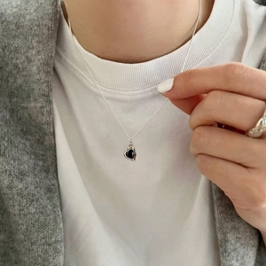 925 sterling silver necklace with heart black zircon pendant on a fashion model