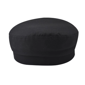 Detailed view of black cotton twill sailor cap with flat top and reinforced hat wall