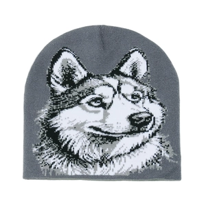 Detail of knit wolf head pattern on dark grey beanie with fine jacquard texture