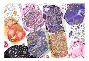 Macro shot of colorful DIY scenery stickers with dance and fantasy room themes on desk