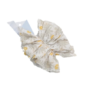 Elegant beige floral scrunchie with yellow flower pattern and white pearl details