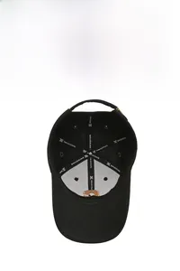 Detail view of the black baseball cap's inner structure with breathable mesh and sweatband