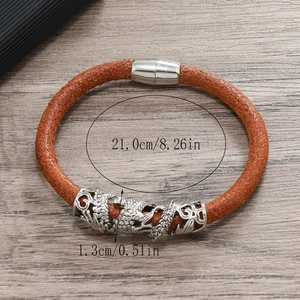 Detailed view showing 21cm length and 1.3cm dragon charm width of this leather bracelet