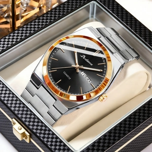 Close-up of two-tone quartz watch featuring day-date display and black sunray dial