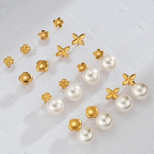 Elegance collection of gold titanium steel earrings with pearls in various chic designs