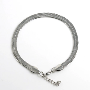 Flat silver herringbone chain bracelet with adjustable lobster clasp on white background