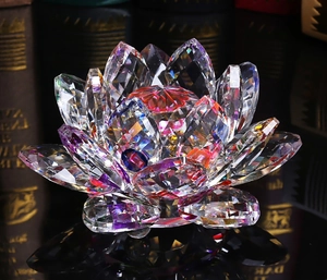 Macro shot of faceted crystal lotus flower decoration with vibrant rainbow light reflections